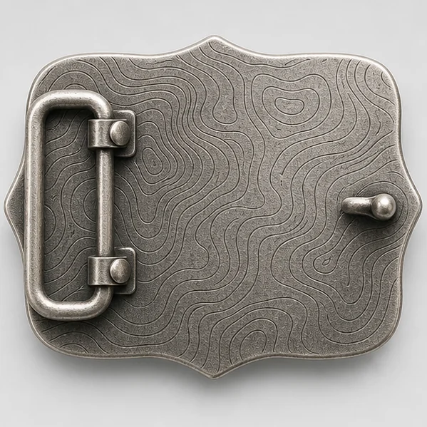 Antique silver belt buckle reverse with fine laser-etched contour pattern