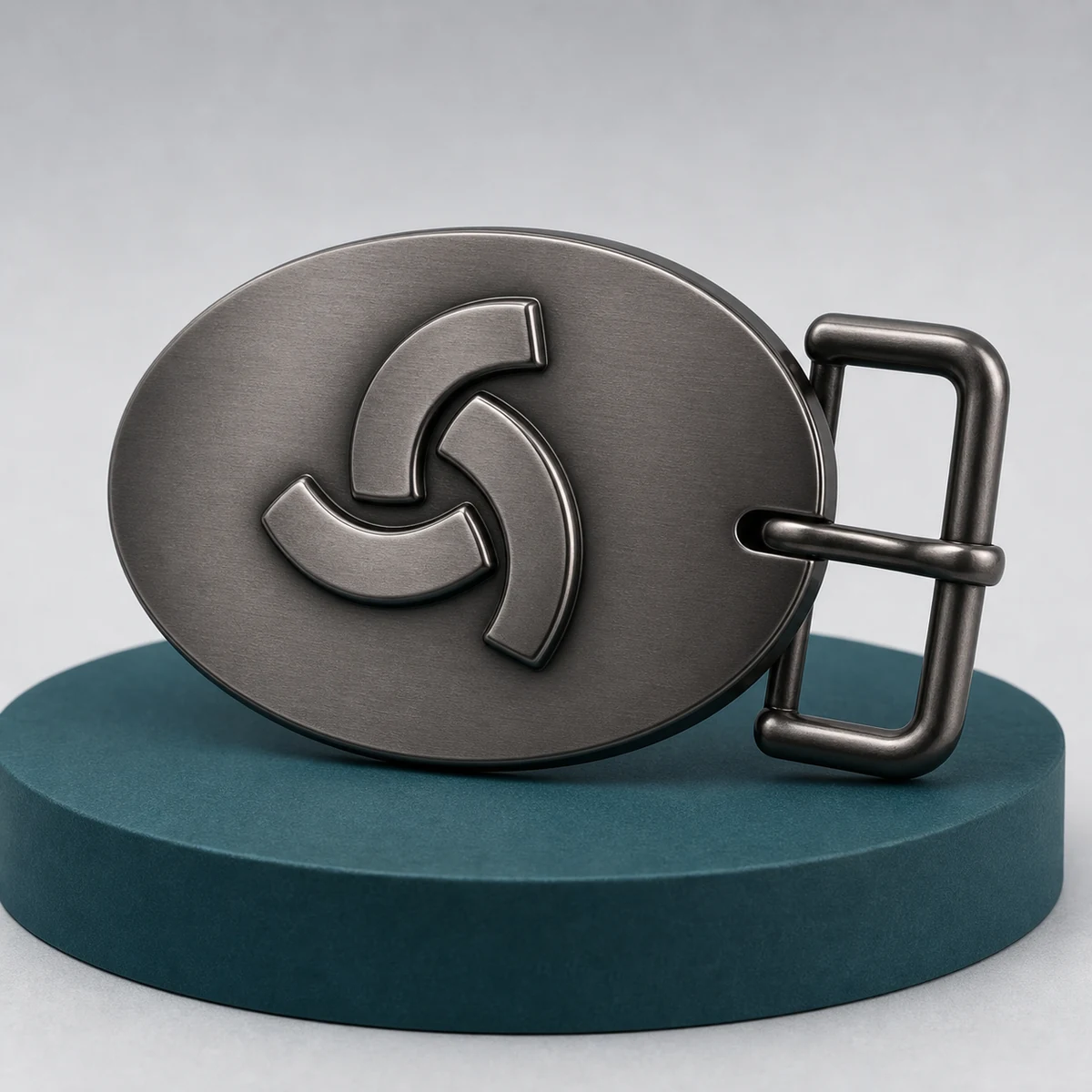 Custom belt buckle with a sculpted three-dimensional logo