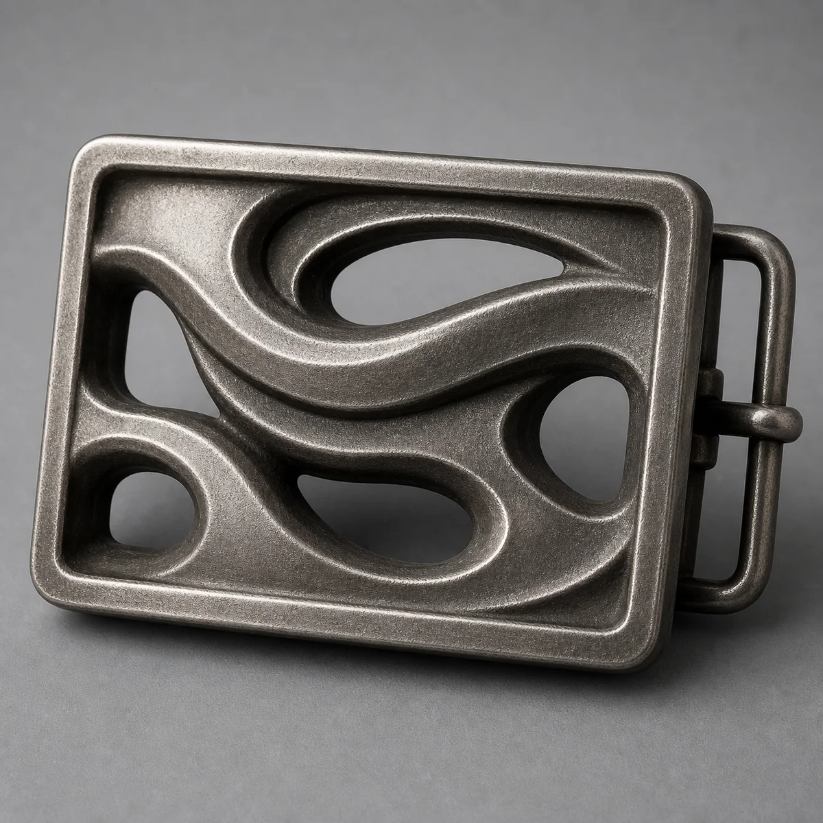 Custom 3D belt buckle combining sculpted relief and interior cutouts