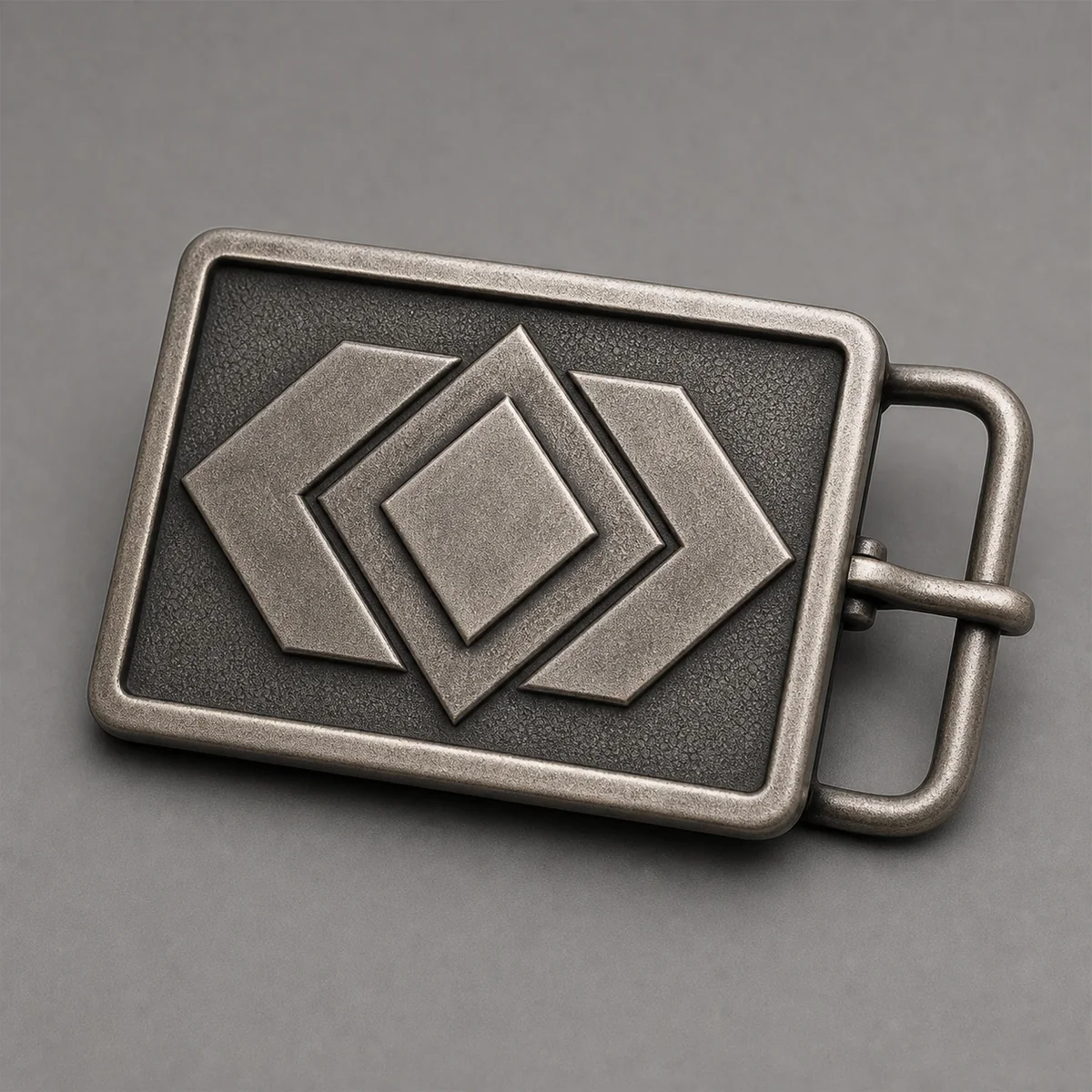 Custom low-relief belt buckle with controlled layered details