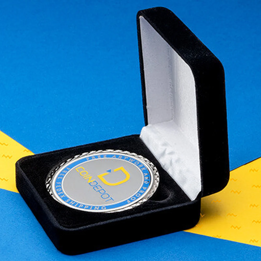 Custom challenge coin displayed in a fitted presentation gift box