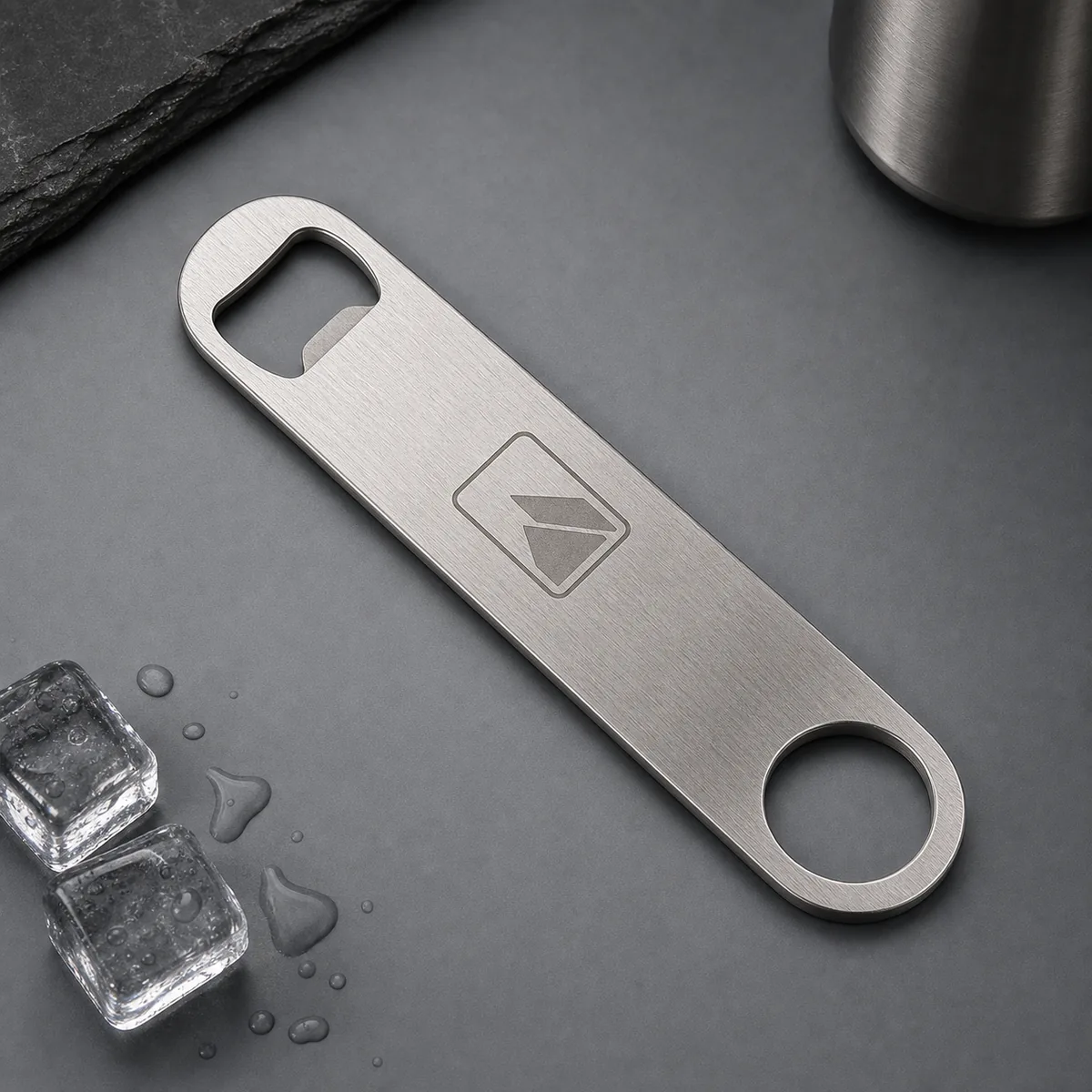 Custom bar blade bottle opener with brushed metal finish