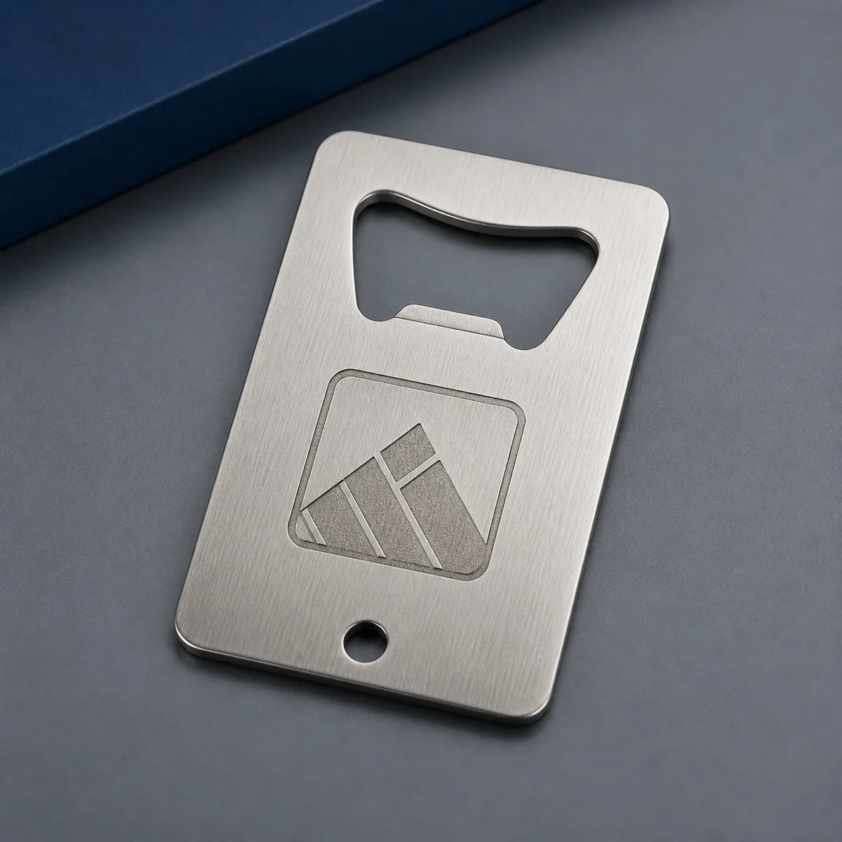 Custom flat metal bottle opener with engraved logo area