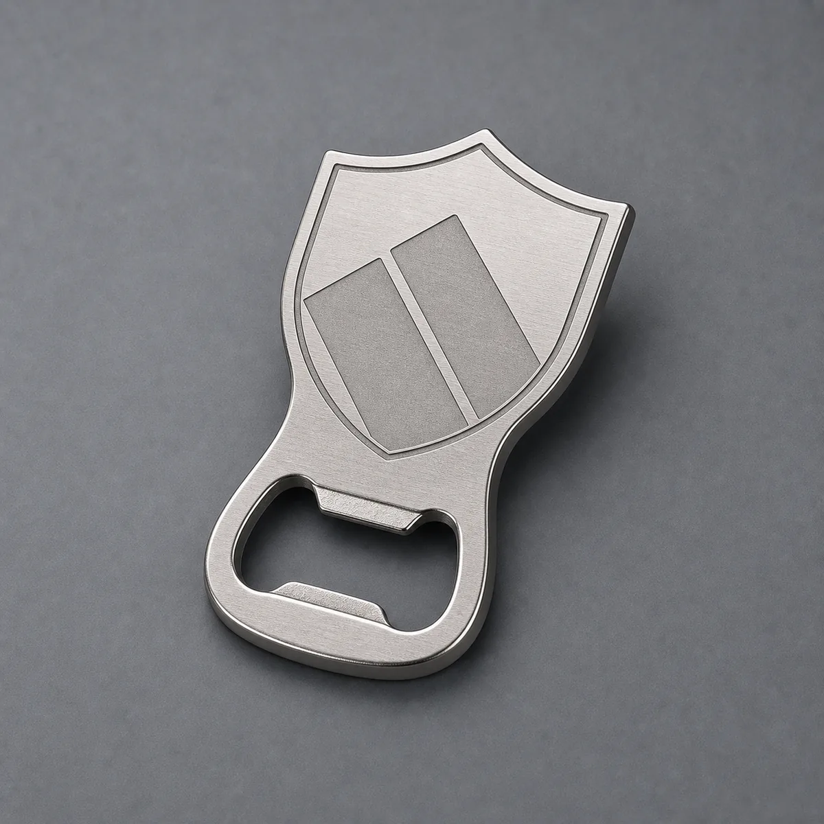 Custom shaped metal bottle opener with practical opening edge